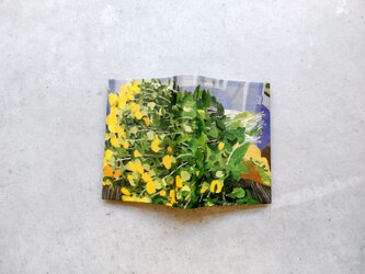 絵本なブックカバー『ベニバナの収穫』の画像