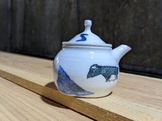 蓋物（自分はワニではないんじゃないか、と思い始めた。 水たまりを眺める）の画像
