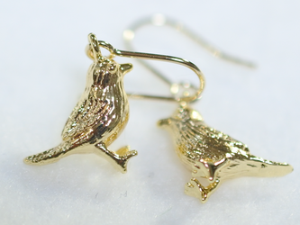 ゴールドチタンピアス・金の小鳥の画像
