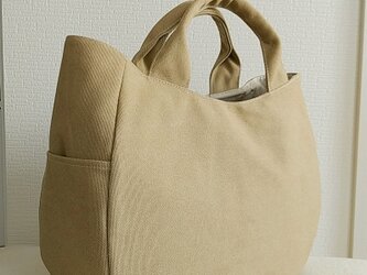 ヴィンテージ加工ベージュ帆布の三日月トートバッグ+pの画像