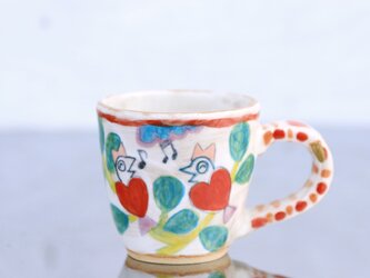 金継ぎ・赤いハート鳥の色絵マグの画像