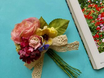 布花 リボンつき可愛いコサージュの画像