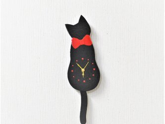 黒ネコの振り子時計の画像