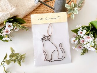のんびり猫の革紐オーナメントの画像