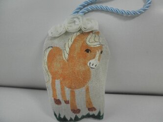 ビスケット色の小さな馬の飾り　(a)の画像