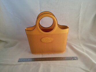 メッシュ.レザーの手提げバッグの画像