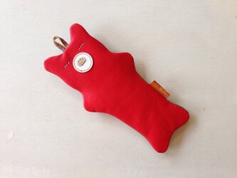 ペンの入るクマの画像