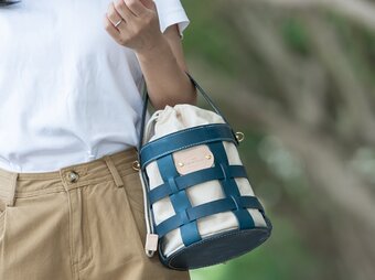 「帆布×革の組み合わせ」籠のような形のショルダートートバッグ 巾着袋 肩掛け 鞄の画像