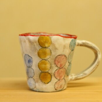 粉引き手びねりカラフルドットのカップ。