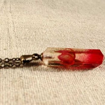 Botanical jewelry Micro rose　in水晶ポイントの画像