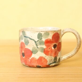 粉引赤いお花のカップ。の画像