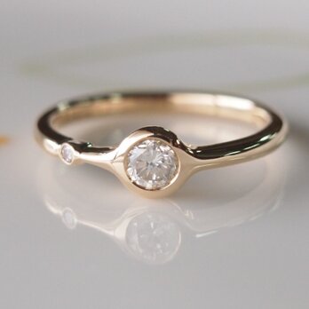 K１８桜色のピンクダイヤ入りダイヤ指輪の画像