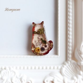 アンティークな猫のピンブローチ　ホムポムの画像