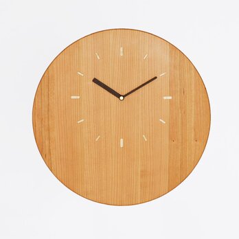 木の掛け時計の画像
