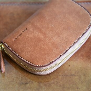 イタリア プエブロレザー ミディアムサイズのラウンドジップウォレット【コニャック】