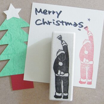 クリスマスはんこ　何かを書くサンタの画像