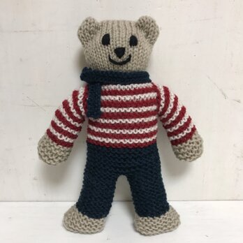 knit kuma in navy pantsの画像