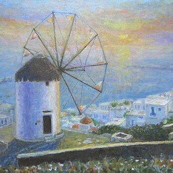 ポニ－の風車と夕日の画像