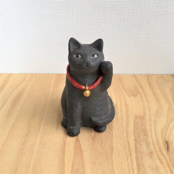 黒猫のまねき猫の画像