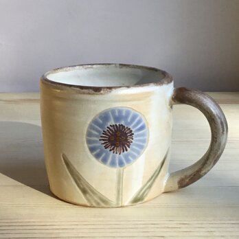 てんとう虫と花のコーヒーカップの画像