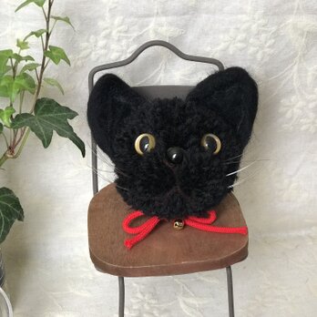 黒猫のぽんぽんの画像