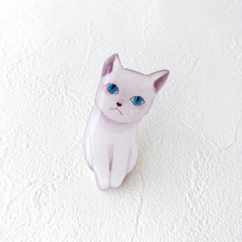 青い目の子猫ブローチの画像