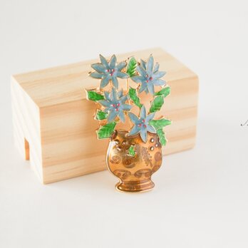 『幸せなフラワーが満開する花瓶のブローチ』の画像