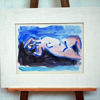 横たわる裸婦の画像