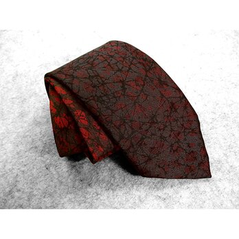 シルクネクタイ（レオパード模様織り）（ロウ割れ模様）（ボカシ染）（赤色　黒色）の画像