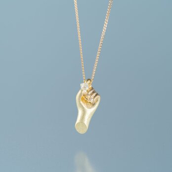 ダイヤモンド原石　手のネックレスの画像