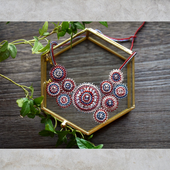 アラベスク-林檎色のビーズネックレス-の画像