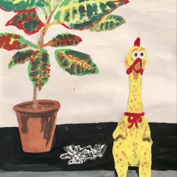 植木と鎖と鳥のおもちゃの画像
