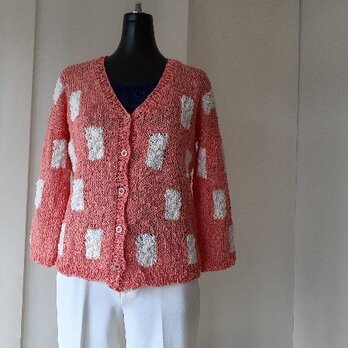 オレンジとホワイトの編み込みカーディガン