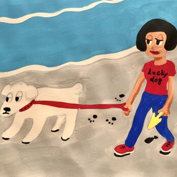海辺を犬と散歩の画像