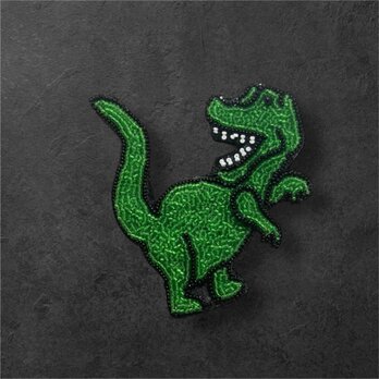 恐竜　ティラノサウルスのビーズ刺繍ブローチ　　(リュネビル刺繍)の画像
