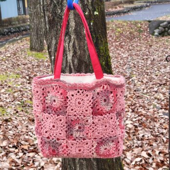 春待ち色の手編み丸小さめトートバック(ピンク)の画像