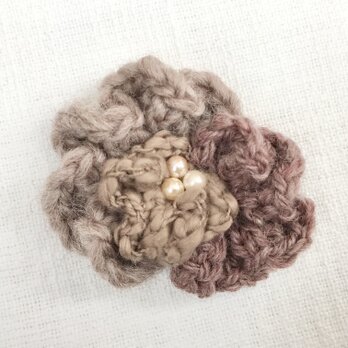 糸を編んだお花のブローチ2 (ブラウン)の画像