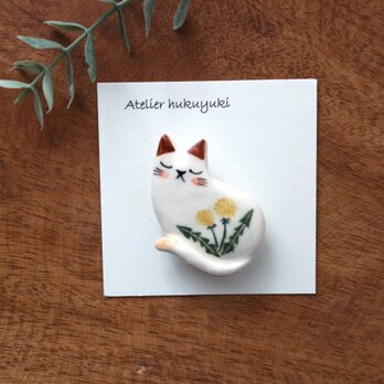陶器で作った花ネコのブローチ  ( タンポポ )の画像