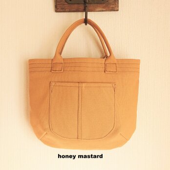 帆布の hand bag【honey mastard】の画像