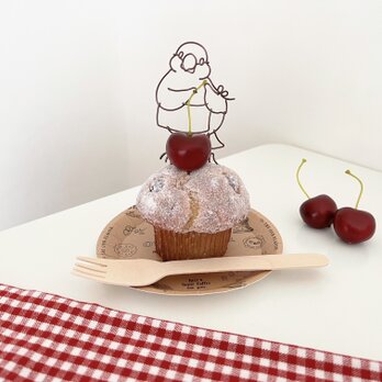 お菓子作りが大好きな文鳥のマフィンオブジェの画像
