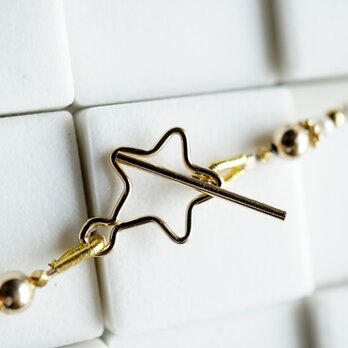 星を添えた小粒パールのネックレスの画像
