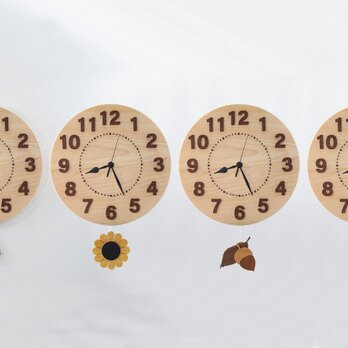 四季を楽しむ檜の振り子時計の画像