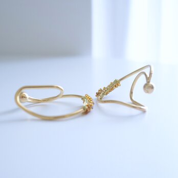 Orange lace egg , ear cuffの画像