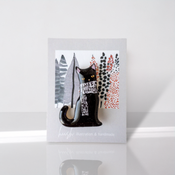 冬支度の黒猫ブローチの画像