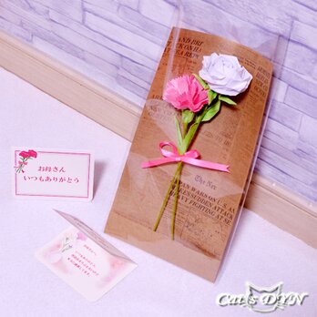 ピンクのカーネーションと薔薇の花（折り紙の薔薇の花）の画像