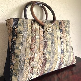 帯地斜め剥ぎの手提　三角のマチの画像