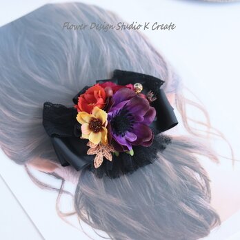 ハロウィンカラーのお花と秋の実のヘアクリップ　ハロウィン　ハロウィーン　コスプレ　パーティー　フェス　イベントの画像