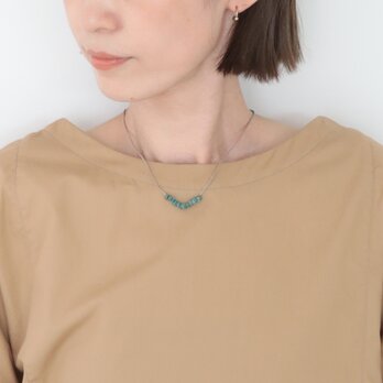 Turquoise neklace / 紐ベージュの画像