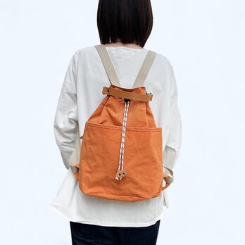 ちょこっとリュック：オレンジ（KONBU　撥水加工ナイロン素材　巾着リュック）受注製作の画像