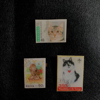 猫切手のブローチの画像